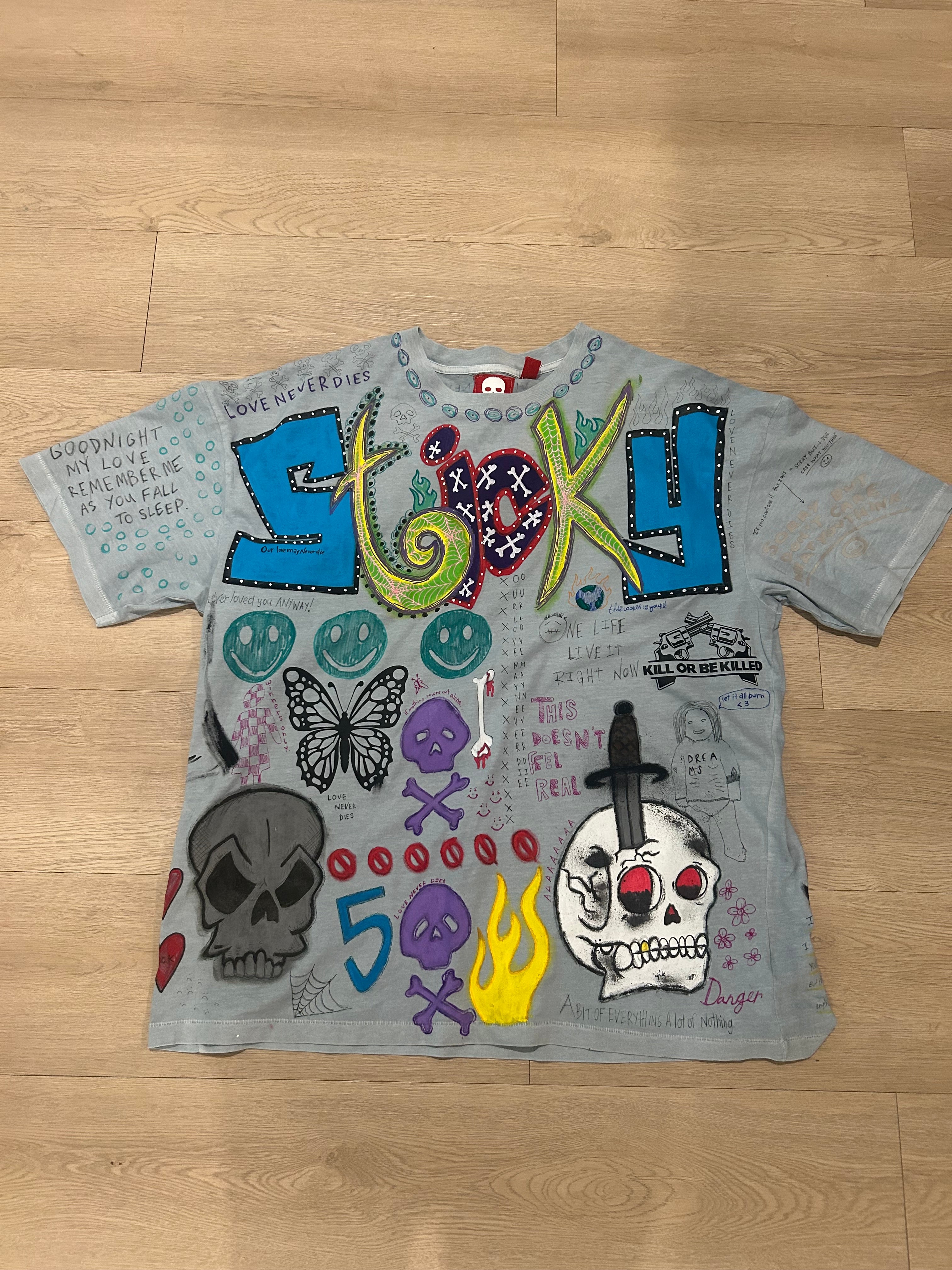 Sticky “The World Is Yours” Tee