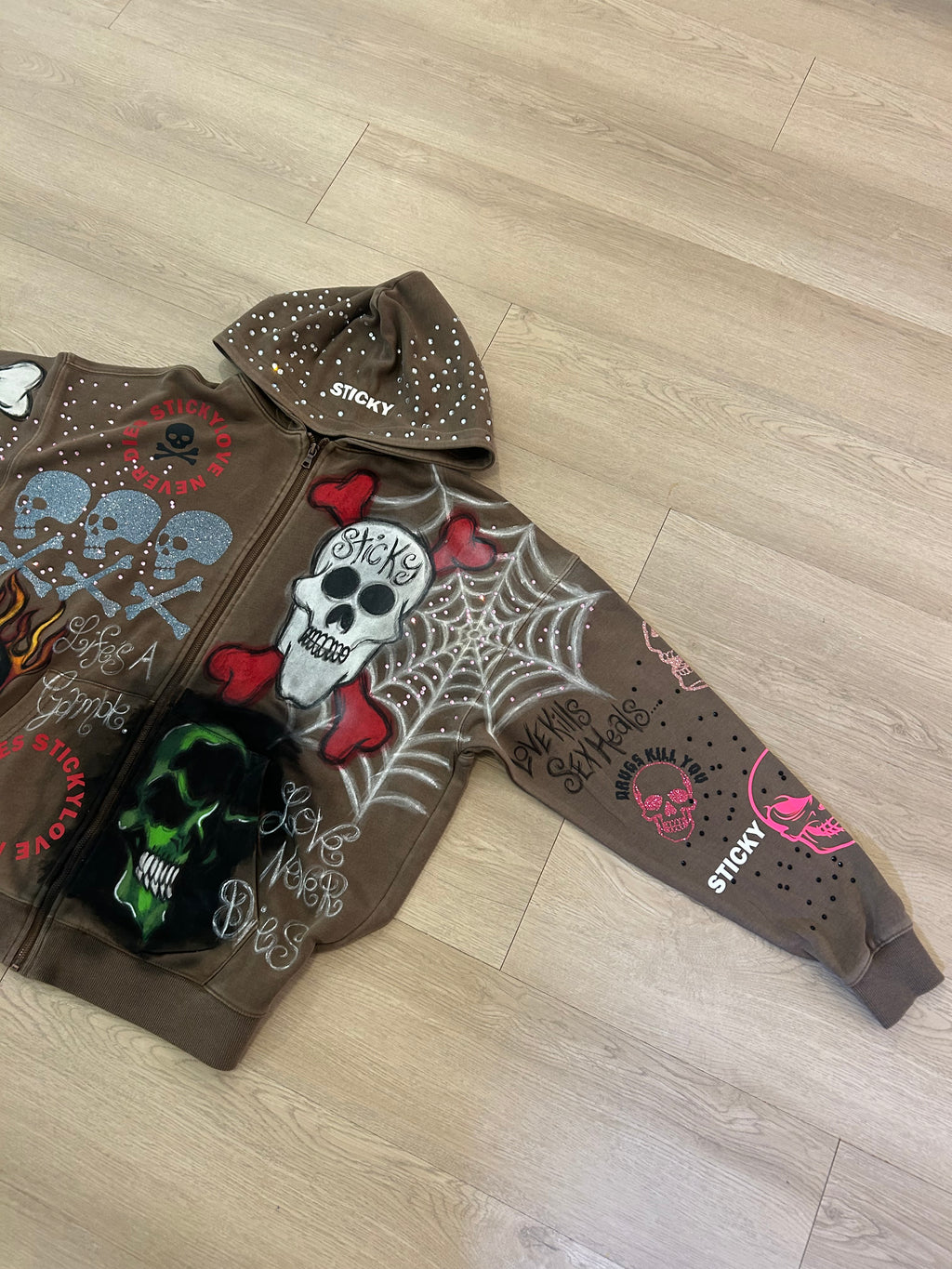 Sticky “Life’s A Gamble” Zip Up